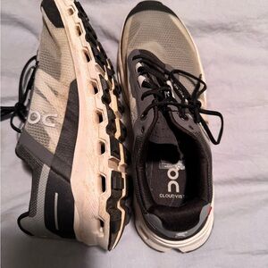 On Running Gray and Black Athletic Shoes